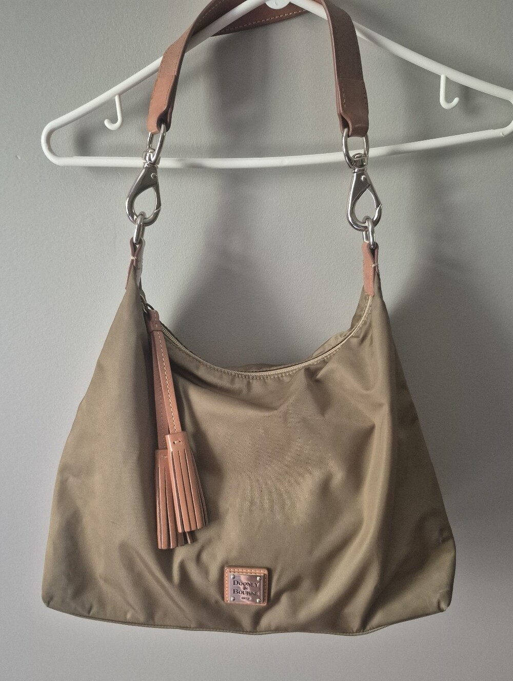 Dooney & Bourke Tan Nylon Hobo with Tan Leather Trim And Tassle Detail
